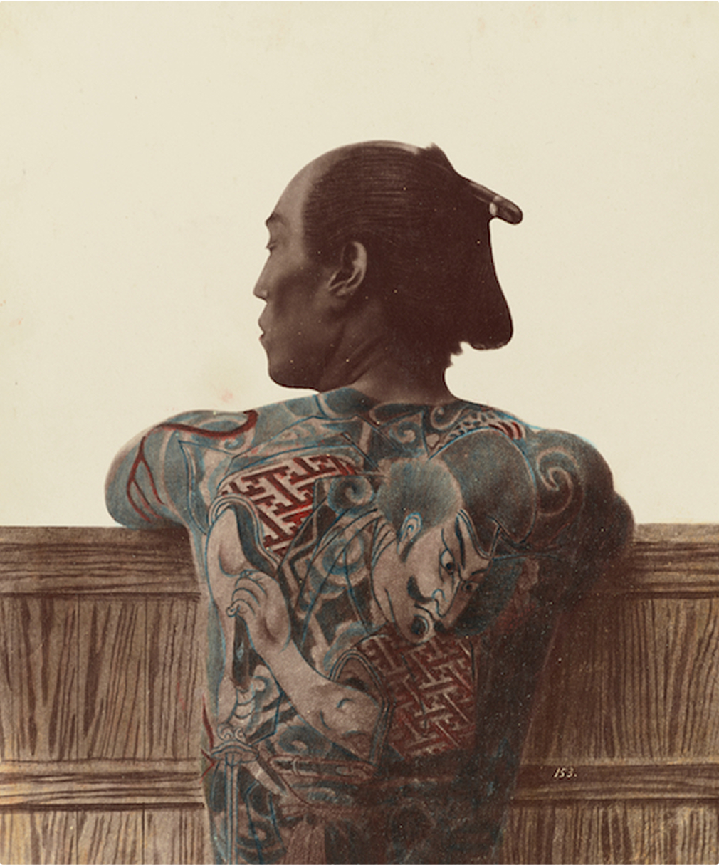 old photograph of Japanese man with back tattoo