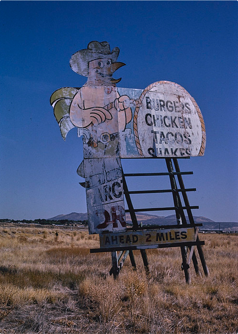 photograph of old road sign